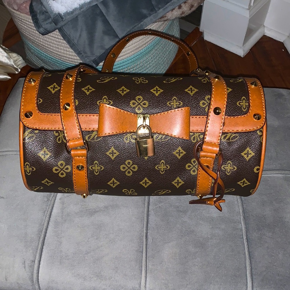 Brown cylinder bag (canvas )